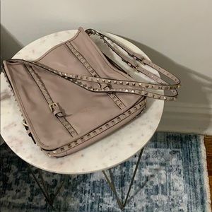 - Valentino bag this bag is slightly worn but in great shape.